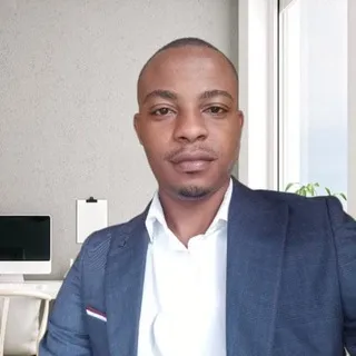 Dr.Christian KAMWINA